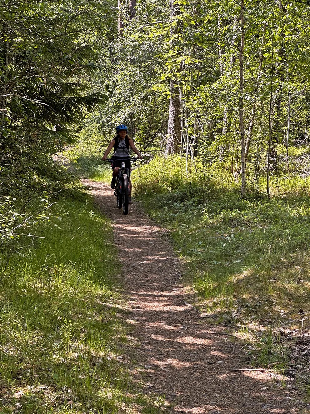 Mountain biking on a dirt trail